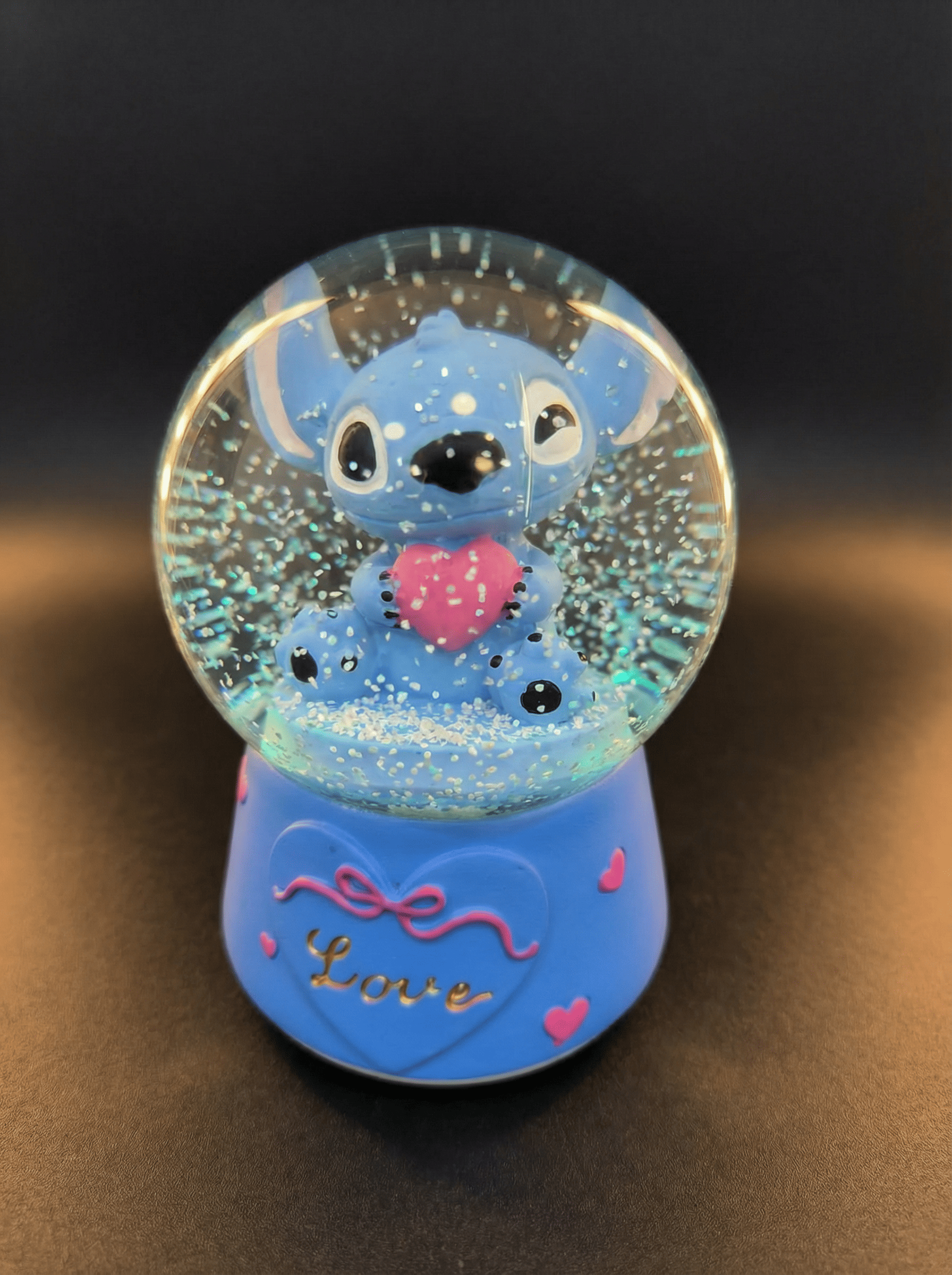 Stitch Kalpli ve Işıklı Müzikli Kar Küresi